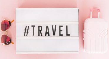 essentials products in your suitcase - pink