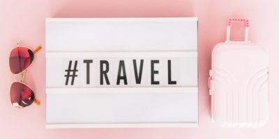 essentials products in your suitcase - pink