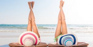 flawless skin after summer-women-legs-beach